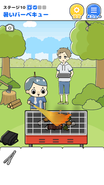 公園でバーベキューをする友達とロボット少年のワンシーン